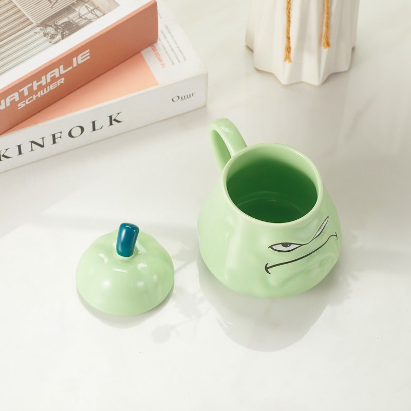 Green Grumpy Face Ceramic Mug with Lid Removed