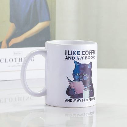 I Like Coffee And My Books Ceramic White Coffee Mug side view