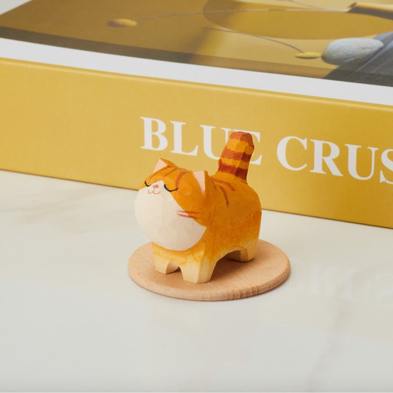 Wooden orange cat figurine 