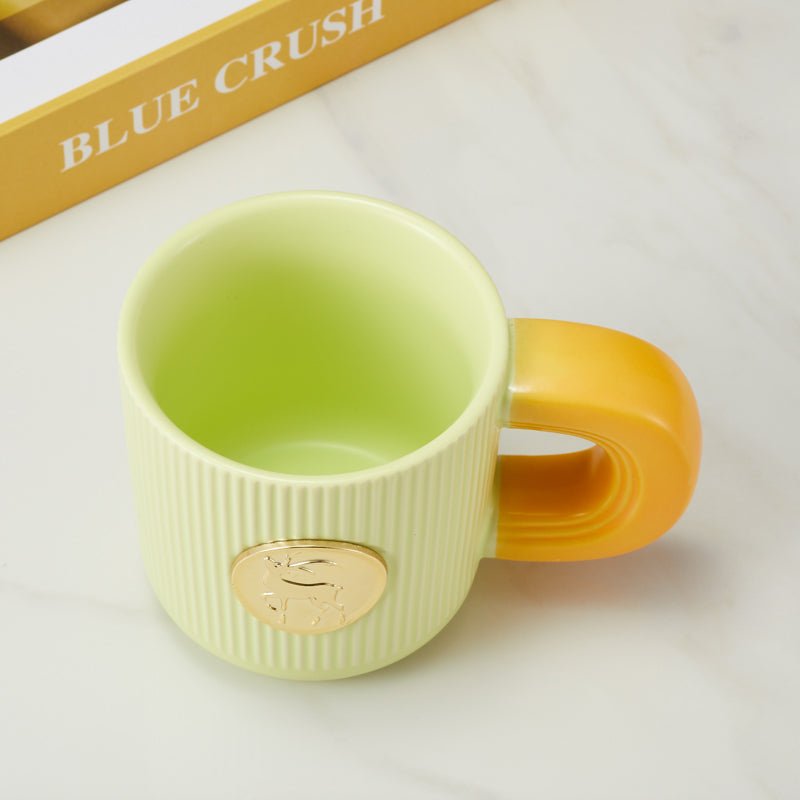 Top View of Elegant Ceramic Mug with Gold Deer Emblem