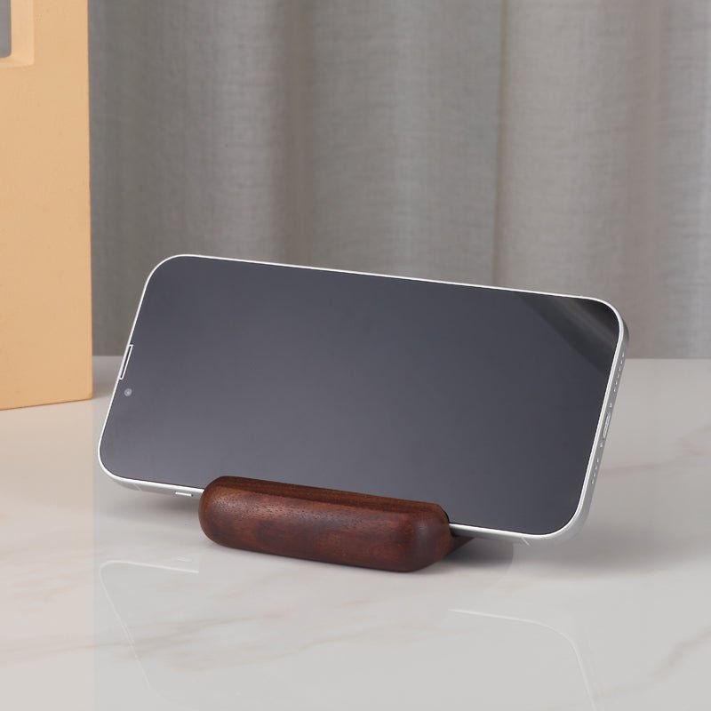 Wooden phone stand holder displaying a smartphone horizontally (front view)