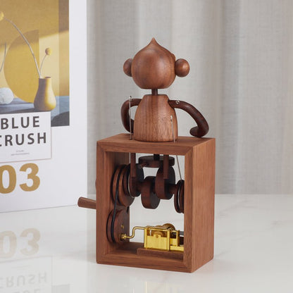 Handcrafted wooden monkey music box